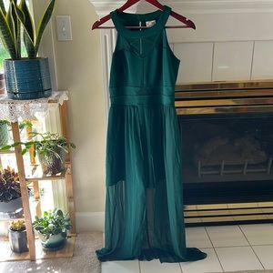 Short long romper w/ see through long part of romper. Never worn and beautiful.